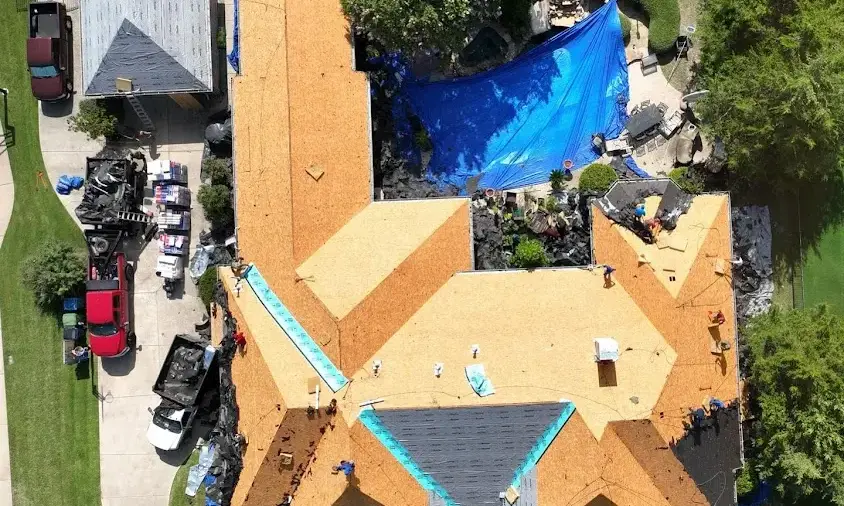 Professional Storm Damage Roof Repair being performed in White Bear Lake